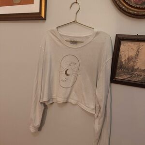 white long sleeve crop tee with graphic
